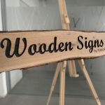Wooden sign with engraved name